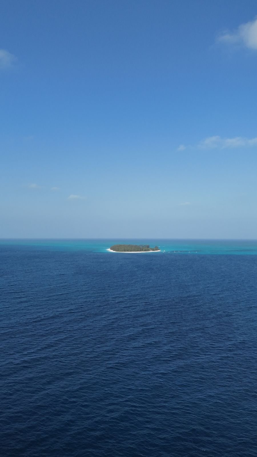 Mnemba Atoll seen from the deep blue Indian Ocean off Zanzibar's north-east coast